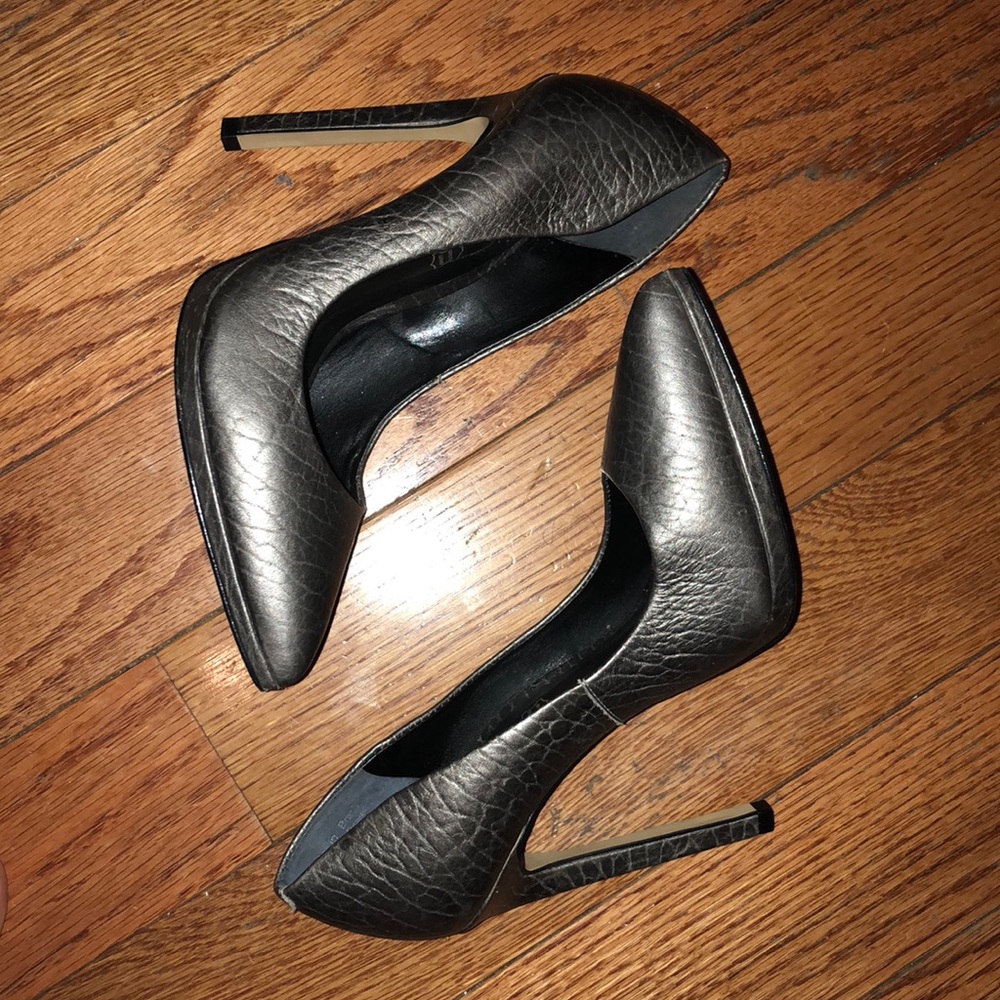 High, silver pumps